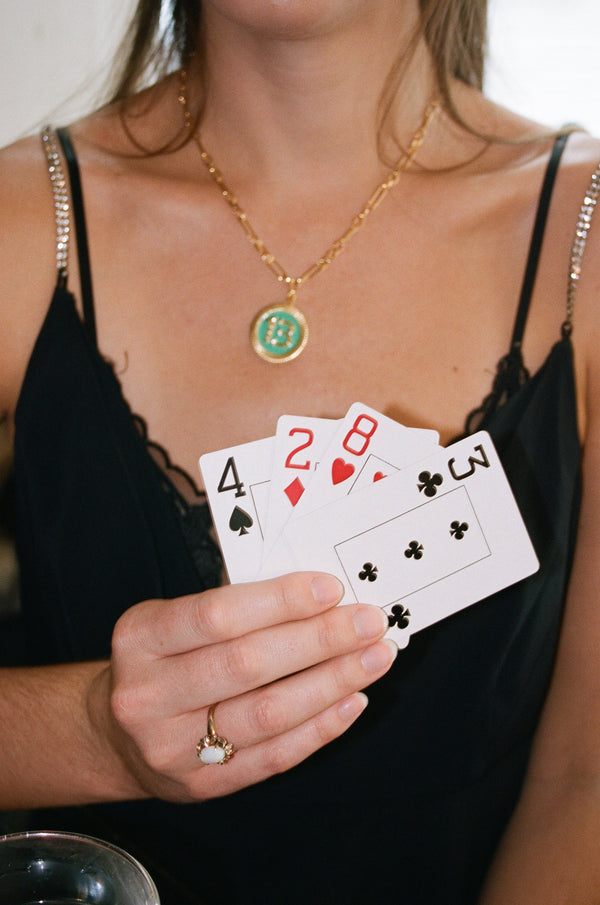 model in lucky 13 green poker chip necklace