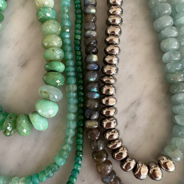Gemstone Necklace Laid Out in a Row