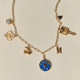 Jane Chain with small bezel, flying piggy, Nashville iris, love and fear coin, compass key, small letter M, two-toned heart - silver side