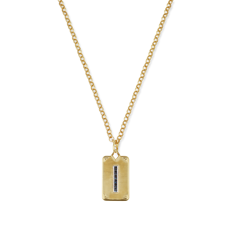 Gold necklace with a rectangular pendant on a white background