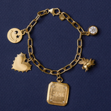 Heritage Bracelet Chain with Smiley Face Charm, Small Heart of Gold Charm, Soul or Ego Charm, Flying Piggy Charm, and Bezel Charm