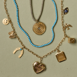 Law of Attraction Coin on Gold Lurex Cord, Turquoise Tennis Necklace, and custom charm neckace: Chunk Chain, Smiley Face, Butterfly, Law of Attraction Magnet, Heart Vesta Case, Soul or Ego, Dice, Bird, Evil Eye Charm.
