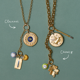 Classic Rolo Charm Clip Lariat Necklace with Law of Attraction Coin, Blue Enamel Bezel Charm, Carpe Diem, and Apple Charm; Chunky Rolo Charm Clip Lariat Necklace with Dream Bigger Coin, Large Divine Spark Matchstick, Chartreuse Enamel Bezel Charm, Small Luck and Love Clover Charm