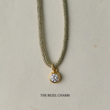 The Bezel Charm on Gold Lurex Cord