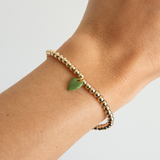 Bead Bracelet with Mini Green Enamel Heart Charm