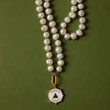 enamel resilience bee on pearl necklace