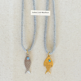 silver lurex cord with (2) fish charms