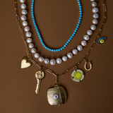 Turquoise Tennis Necklace, Pearl Necklace, and loaded custom charm necklace