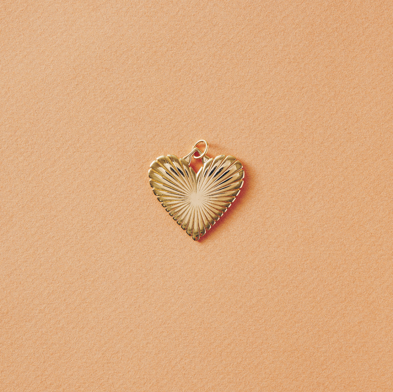 ribbed heart of gold charm