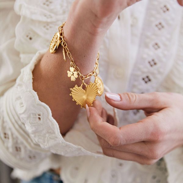 Rose gold charm bracelets with lovely trinkets -